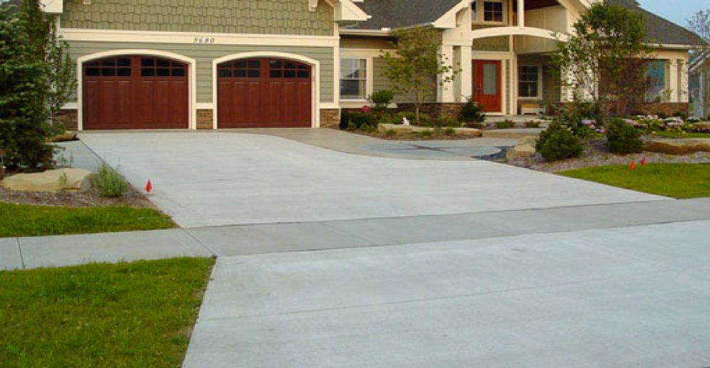 A finished, level concrete driveway