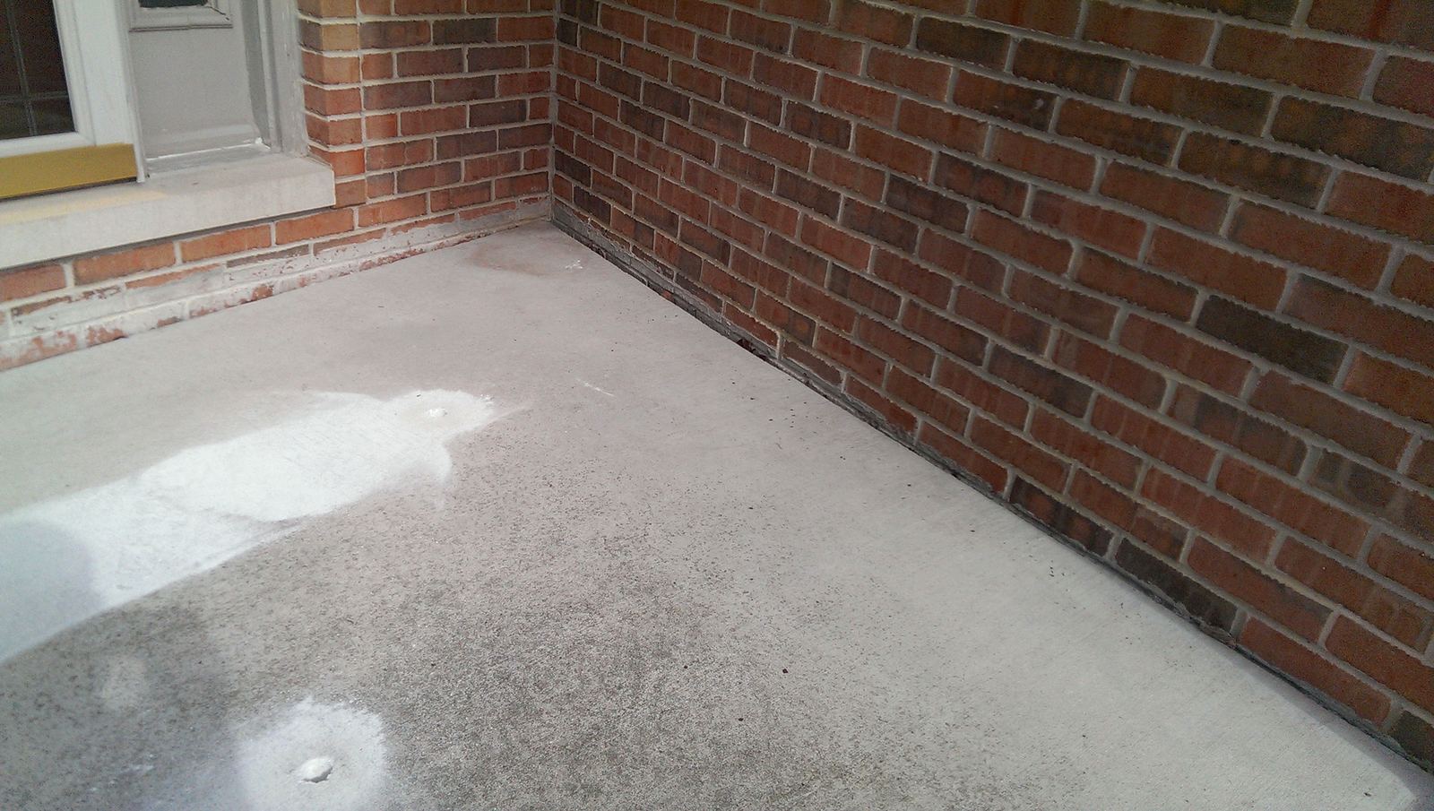 Concrete patio raised back to level